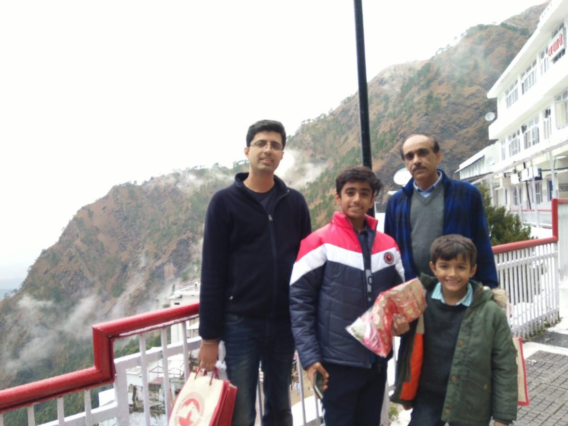 Family on a pilgrimage in the mountains