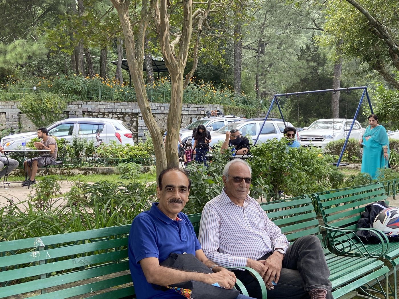 Rajiv Sachdev with a dear companion in a garden