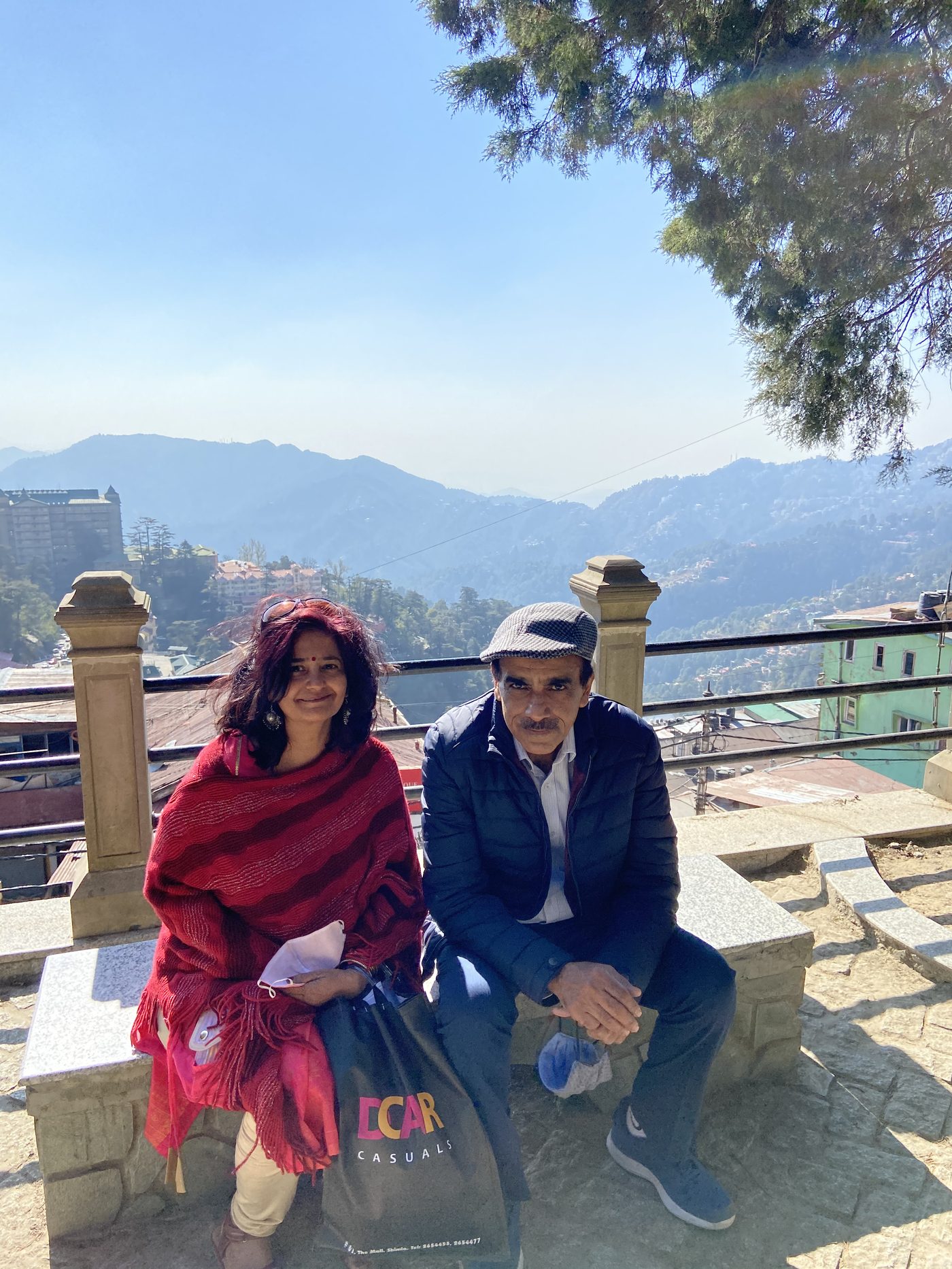 Rajiv Sachdev with his wife in the hills
